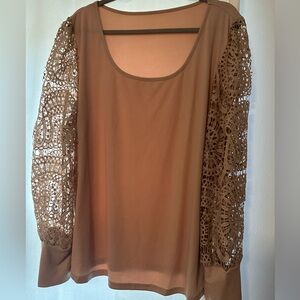 Beautiful long sleeve beige top. Never worn.